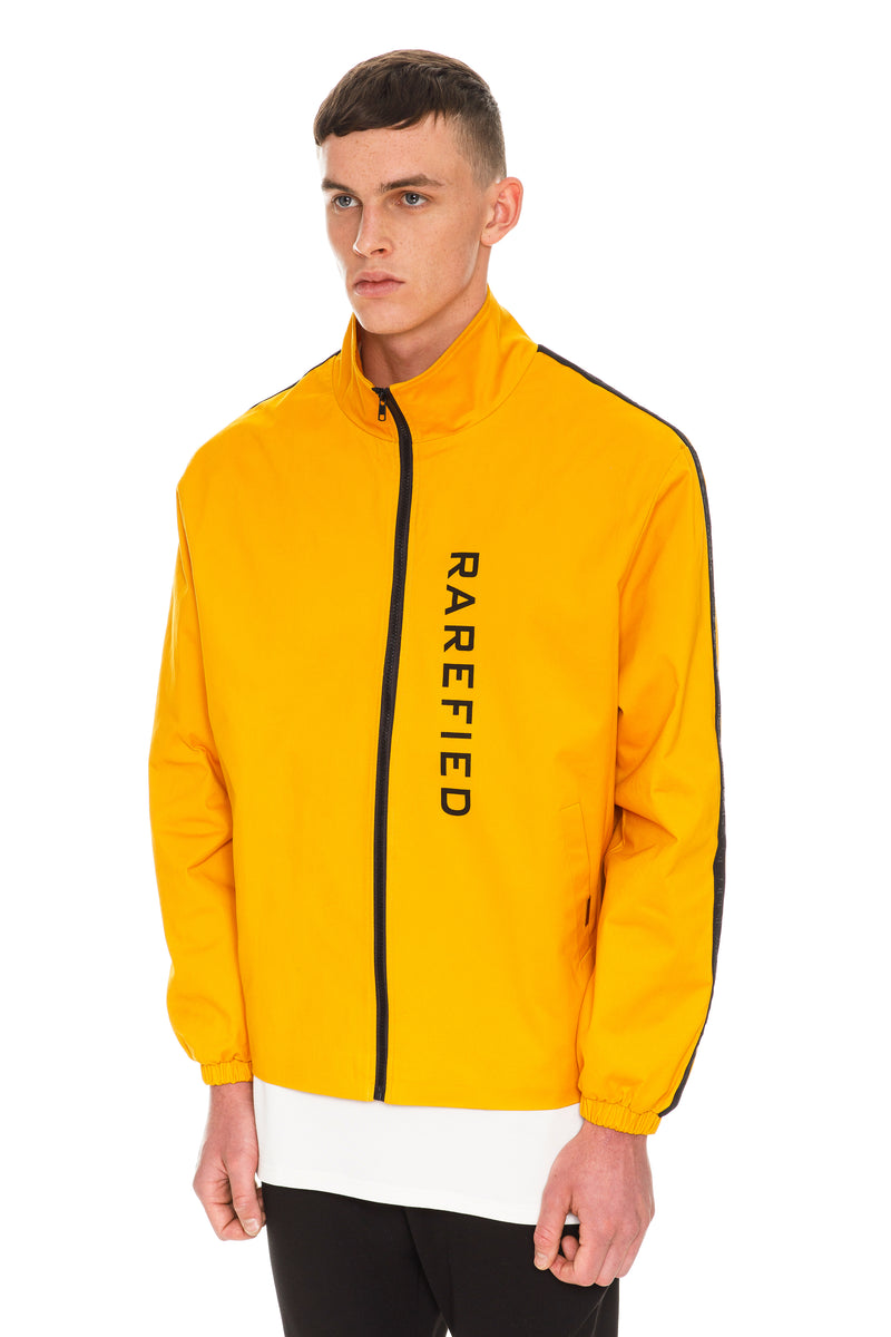 Mustard Rare Jacket With Embroidered Rarefied Quote & Black Striped Sleeves
